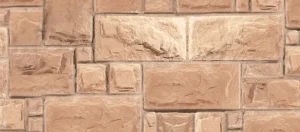 Light brown rectangular and square stone bricks arranged in a staggered pattern forming a wall.