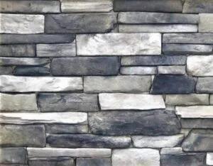 Gray and white rectangular stone bricks arranged in a horizontal, staggered pattern on a wall.